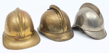 A French brass fire helmet,