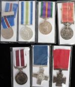 An International Submarine Service Medal: together with a group of six reproduction medals(7)