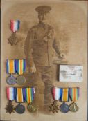 A framed group of WWI medals: comprising 1914 -15 Star 'G-6036 Pte C Tucker R Fus',