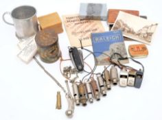A collection of eight WWII period whistles: including two ARP whistles by J Hudson & Co and two