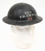 A WWII Mk II 3A steel helmet for London County Council Tramways: the blue shell stencilled 'LCC