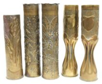 A pair of Trench Art vases with stipple and repousse decoration over waisted,