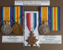 A WWI family group of three: '5231/202331 Pte John Wikcockson 2nd/4th Kings Own Yorkshire Light