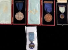 A silver International Union of Musicians medal, maker Vaughton & Sons,