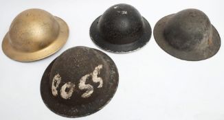 Four various WWII period MKII pattern steel helmets: including one by Briggs Motor Bodies Ltd ,