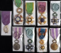 A group of nine French medals/orders: comprising two Orders of the Black Star,