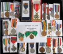 A group of various African Orders and medals: including a Republic of Central Africa Order of the