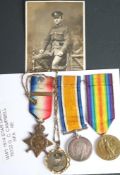 A WWI Trio to '76332 Dvr G C Campbell RFA': 1914 Mons Star with clasp and rosette,
