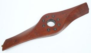 A laminated mahogany propeller section: the eight brass studded boss stamped 'AD 543 RH' and 'G718
