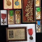 A group of French orders and decorations: including an Order of Social Merit,