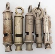 A group of four whistles: comprising 'Girl Guides', 'The Ecma City', 'The Acme City',