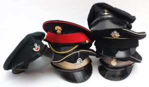 A group of six various peaked caps,