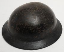 A WWII Plasfort 'Bakelite' MK II pattern helmet: with original liner and chinstrap,