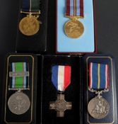 A group of five commemorative medals,: comprising Battle of Britain Medal with 'Home Guard' bar,