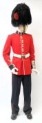 An ERII Coldstream Guards uniform: comprising bearskin, tunic and belt, trousers,