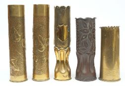 A pair of Trench Art vases: together with three others with stipple and repousse decoration,
