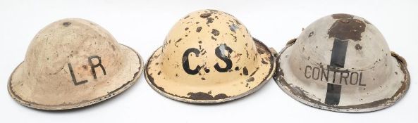 Three WWII Home Front Mk II steel helmets: all white, one for Light Rescue (LR),