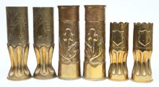 Three pairs of WWI Trench Art vases: with stipple ground and repousse decoration (6)