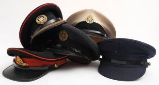A post war period RAF blue cloth peaked cap: together with a RAF Police peaked cap,