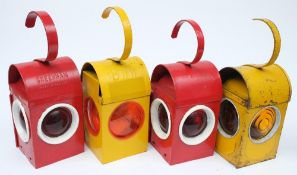 A group of four 'Road Danger 'Lanterns' by Chalwyn, Greenham and others: two in yellow,