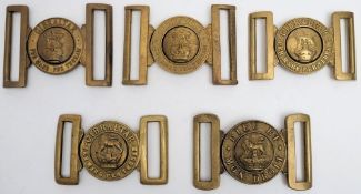 Four Royal Marines brass belt buckles and an All Corps & Regiments Parade buckle: (5)