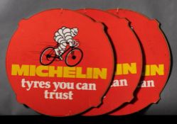 Three Michelin 'Tyres You Can Trust' hardboard bicycle advertising signs: with an image of Bibendum