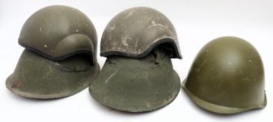 Two National Plastic Combat Vehicle Crewman's Helmets: together with two MKIII 'turtle' steel