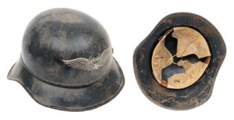 A WWII German Luftschutz Gladiator pattern steel helmet: of three piece construction,