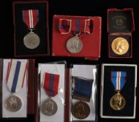 A group of seven Elizabeth II Coronation and Jubilee medals and medallions: comprising two