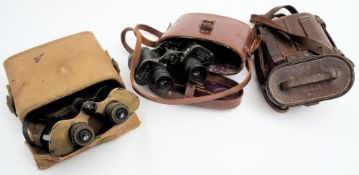 A pair of WWI period French filed glasses by L Petit, Paris: with brown pigskin covered tube ,