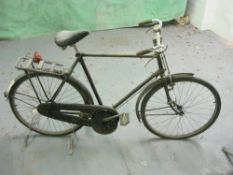 A Raleigh all steel bicycle: black frame with plated handlebars, bar brakes,