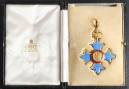 A Military CBE in case of issue: gilt and enamel,