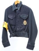 A post war (1950) ARP blouse: with Civil Defence breast pocket badge and Civil Defence Corps Warden