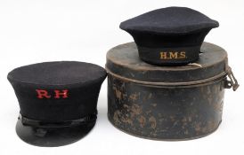 A Royal Hospital Chelsea blue cloth peaked cap: with red 'RH' to front and numbered '282' to