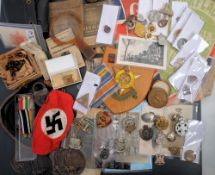 A collection of various military and civil cap and lapel badges: including ARP etc.