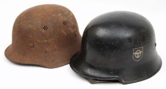 A German M40 pattern stahlhelm: black with double decals, brown leather liner to interior,