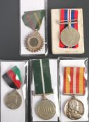 A Voluntary Medical Service Medal: together with a WWII War Medal,