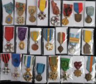 A group of French Orders and Decorations: including two Crosses of Honour for Society for