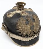A M1860 pattern picklehaube: the black leather skull with silver plated spike and cross guard with