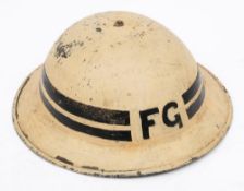 A WWII Fire Guard Sector Captain Mk II pattern steel helmet: white with letters 'FG' front and back