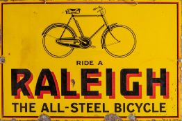 A Raleigh enamel advertising sign 'Ride A Raleigh The All Steel Bicycle' by Sells Ltd London: black