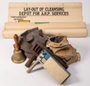 A WWII Fiddian ARP bell: with wooden handle together with four Home Office ARP Anti Gas posters by