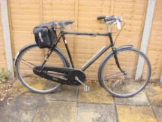 A Raleigh All Steel bicycle: black frame with plated handlebars, lever brakes,