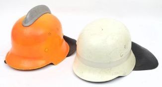 A German M35 pattern Fire Service helmet: fluorescent green with reflective band and black leather