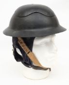 A WWII Cromwell pattern 'pulpware' helmet: of two-piece construction with single shell and