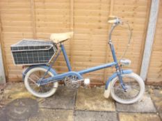 A Raleigh RSW Mk II bicycle: blue step through frame with white lettering: chrome plated handle