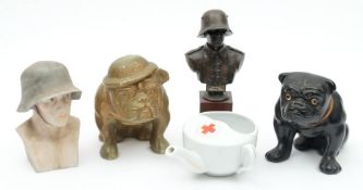 A WWII period plaster bulldog 'Hitler's Terror': together with one other plaster bulldog with glass