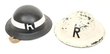 Two WWII Mk II pattern 'Rescue' steel helmets;