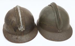 A WWII French Artillery M26 Adrian steel helmet: in green with attached comb and helmet plate,