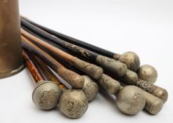 A group of thirteen various swagger sticks,